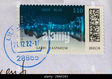 German Postage Stamp stuck on envelope Stock Photo