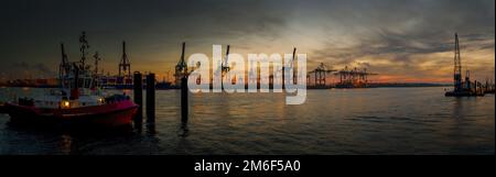 Large panorama of the Hamburg harbor in the early evening in autumn Stock Photo