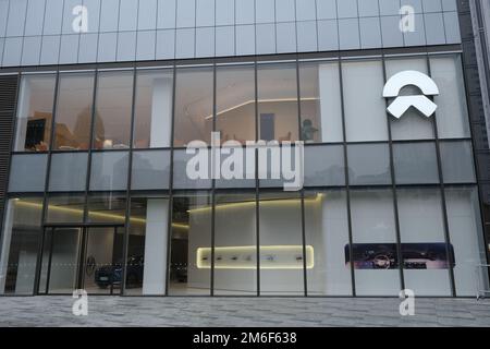 Wuhan, China-Oct.5th 2022: facade of large Nio electric car retail store with brand logo. Chinese EV brand Stock Photo