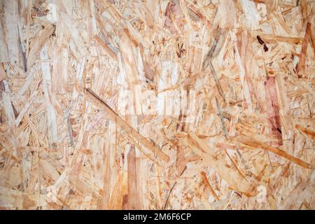 OSB sheet is made of brown wood chips Stock Photo