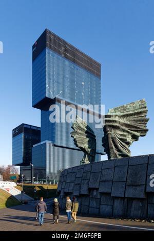 KTW office complex designed by Medusa Group (left), and the Silesian Uprisings memorial (wings, right) by sculptor Gustaw Zemla. Stock Photo
