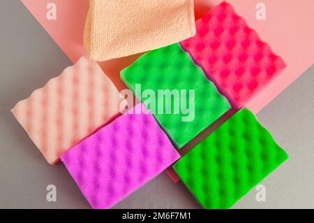 Cleaning kit and cleaning bathroom and kitchen, colorful sponges, the concept of spring cleaning Stock Photo