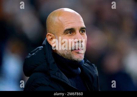 File photo dated 31-12-2022 of Manchester City manager Pep Guardiola who feels Manchester City have their work cut out to catch Arsenal in the Premier League even though the leaders dropped points on Tuesday. Issue date: Wednesday January 4, 2023. Stock Photo