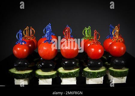 Canapes on skewers Stock Photo