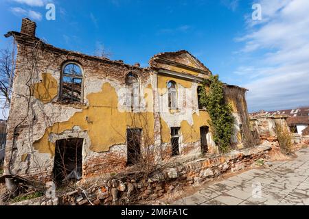 Brick abandoned old house with broken windows in Sofia Stock Photo