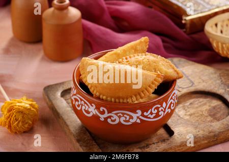 Indian Traditional Sweet Food Gujiya or Gujia made during the Holi Festival Stock Photo