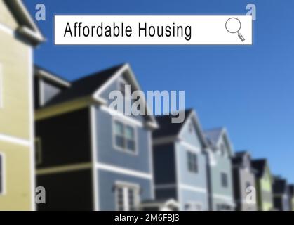 Internet search window with Affordable Housing text and homes in the background Stock Photo