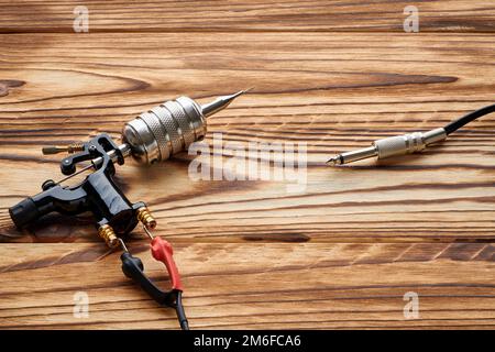 Tattoo Machine Tools Supplies Wooden Background Tattoo Studio Stock Photo  by ©haveseen 479255648