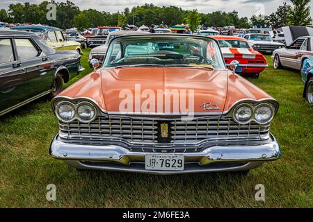 Iola, WI - July 07, 2022: High perspective front view of a 1959 Plymouth Sport Fury 2 Door Hardtop at a local car show. Stock Photo
