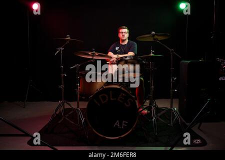 Idles drummer Jon Beavis photographed at Factory Studios, Bristol. Stock Photo