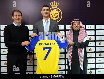 Riyadh, Saudi Arabia. 04th Jan, 2023. Riyadh, Kingdom, Saudi Arabia, January 3, 2023, L-R : French coach Rudi Garcia, Portuguese football star Cristiano Ronaldo and AlNassr Football Club President Mossali Al-Muammar seen at Ronaldo's presentation press conference in Riyadh, Kingdom of Saudi Arabia, on January 3, 2023. Photo by Balkis Press/ABACAPRESS.COM Credit: Abaca Press/Alamy Live News Stock Photo