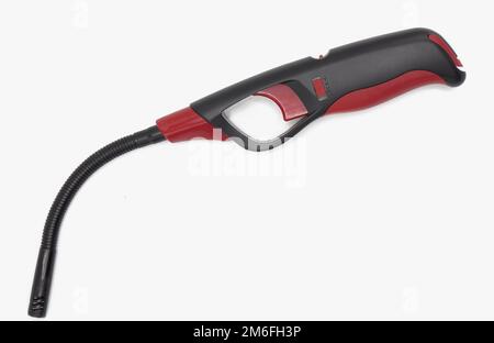 Electric lighter with folding front with protection for candles and gas stove or barbecue Stock Photo