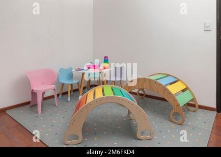 Children's play area in a pediatric office, with tables, chairs and games for children. Stock Photo