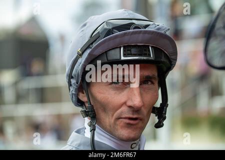 Ascot, Berkshire, UK. 23rd July, 2022. Horse Fresh ridden by jockey Daniel Tudhope (grey silks) wins the Moet & Chandon Internation Stakes at the QIPCO King George Diamond Weekend at Ascot Racecourse. Owner Clipper Logistics. Trainer James Fanshawe, Newmarket. Breeder Glebe Stud. Credit: Maureen McLean/Alamy Stock Photo