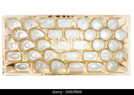 Empty box of chocolate candies isolated on white, top view Stock Photo