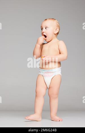 Toddler standing full length diaper boy hi-res stock photography and images  - Alamy