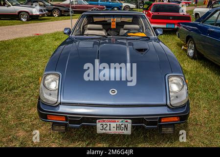 Iola, WI - July 07, 2022: High perspective front view of a 1983 Datsun 280ZX Turbo at a local car show. Stock Photo