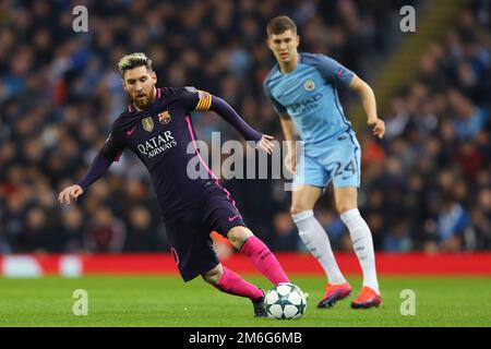 Lionel Messi of Barcelona gets away from John Stones of Manchester City - Manchester City v Barcelona, UEFA Champions League, Etihad Stadium, Manchester - 1st November 2016. Stock Photo