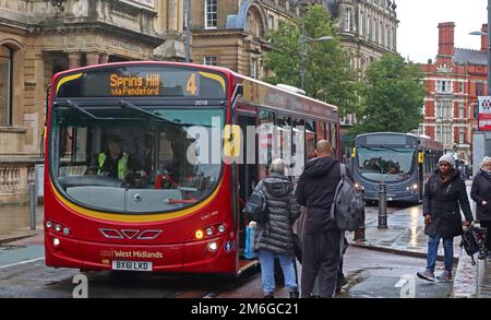 No 4 bus, Spring Hill, via Pendeford, National Express West Midlands transport, red bus, in Wolverhampton town centre - Lexi-Mai Stock Photo