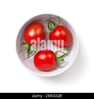 Three Cherry Tomatoes In White Bowl Isolated Stock Photo