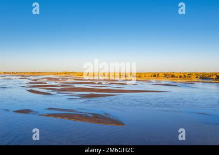 Beautiful natural landscape on black river in autumn Stock Photo