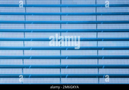 Aerial view of solar panels on lake blue Stock Photo