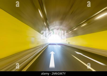 Tunnel scene at bright exit Stock Photo