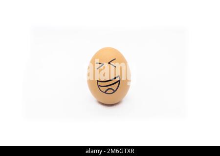 Egg with very happy face on white background Stock Photo