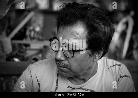 Vadodara, Gujarat - November 19th 2022: Aged Indian man close up face with wrinkled skin and grey hair good and beautiful face Stock Photo