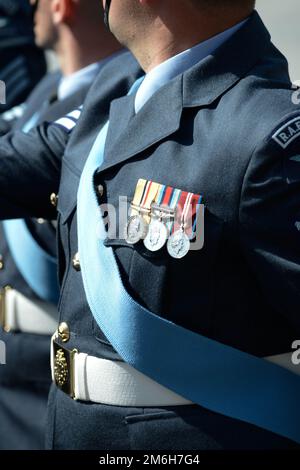 Uniform detail as an RAF Regiment Gunner marches on parade Stock Photo