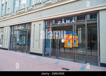 A view of a deserted Kalverstraat during Covid-19 lockdown, in the coronavirus pandemic in Amsterdam Stock Photo