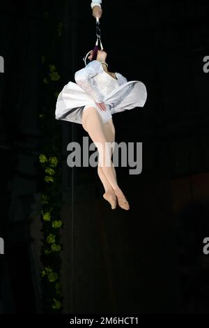 Orenburg, Russia - October 12, 2019: Aerialists perform their number at the circus arena Stock Photo