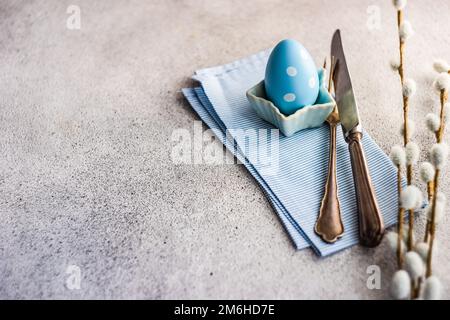 Festive Easter place setting decorated with eggs Stock Photo
