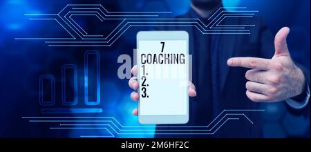 Writing displaying text 7 Coaching. Concept meaning Refers to a number of figures regarding business to be succesful Stock Photo