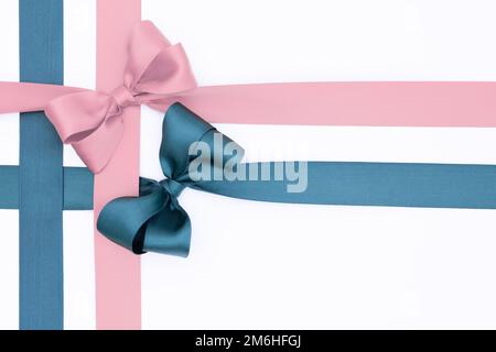 Pink, blue and white satin ribbon bows on wooden background. Scrapbooking  theme Stock Photo - Alamy
