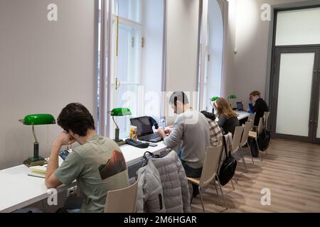 St. Petersburg, Russia - November 15, 2022: Youth, students study in the reading room of the V. V. Mayakovsky Central City Public Library Stock Photo