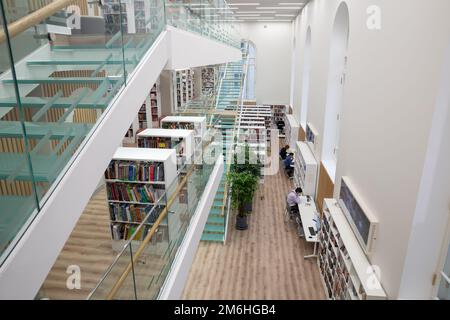 St. Petersburg, Russia - November 15, 2022: Interior of the modern library named after Mayakovsky in an old historical building on the Fontanka river Stock Photo