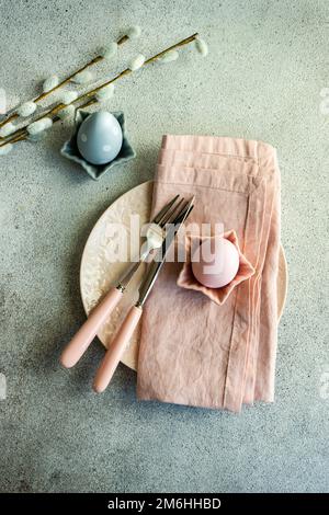 Festive Easter place setting decorated with eggs Stock Photo