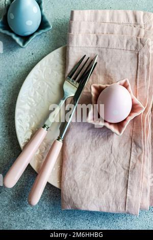 Festive Easter place setting decorated with eggs Stock Photo