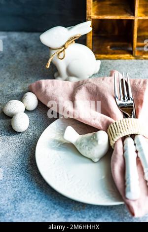 Easter table setting on concrete background Stock Photo