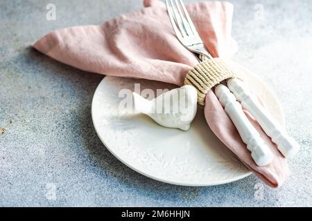 Easter table setting on concrete background Stock Photo