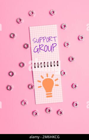 Sign displaying Support Group. Conceptual photo number of people involved in service commitment Stock Photo