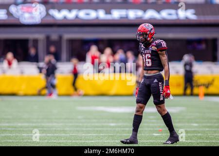 Charlotte, NC, USA. 30th Dec, 2022. North Carolina State Wolfpack safety Rakeim Ashford (16) takes the field during the first half of the 2022 Duke's Mayo Bowl at Bank of America Stadium in Charlotte, NC. (Scott Kinser/CSM). Credit: csm/Alamy Live News Stock Photo