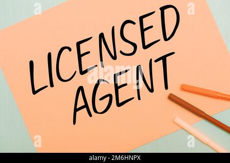 Hand writing sign Licensed Agent, Word Written on Authorized and ...