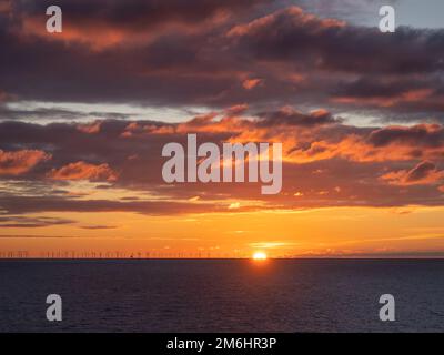 Sunset and Clouds Over English Channel Stock Photo