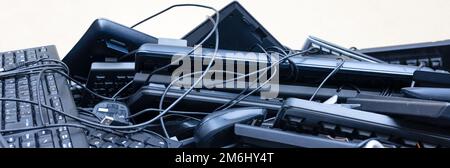 banner or electronic waste computer keyboards and mouse Stock Photo