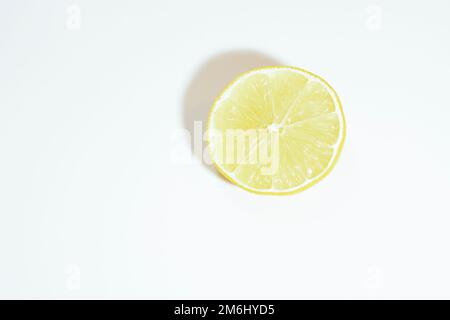 lemon cut in half on white background Stock Photo