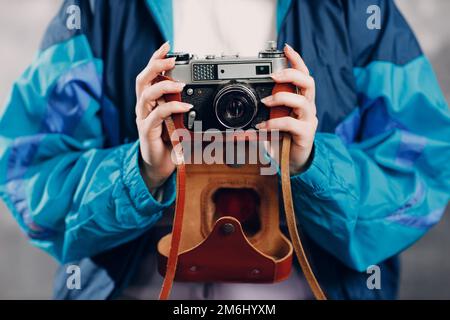 Young sporty woman 80 and 90's style. 90s fashion girl. Stock Photo