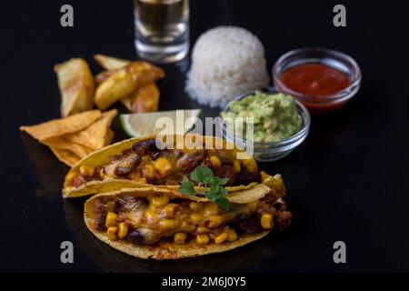 Mexican tacos with rice on slate Stock Photo