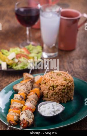 Meat on skewer with rice Stock Photo